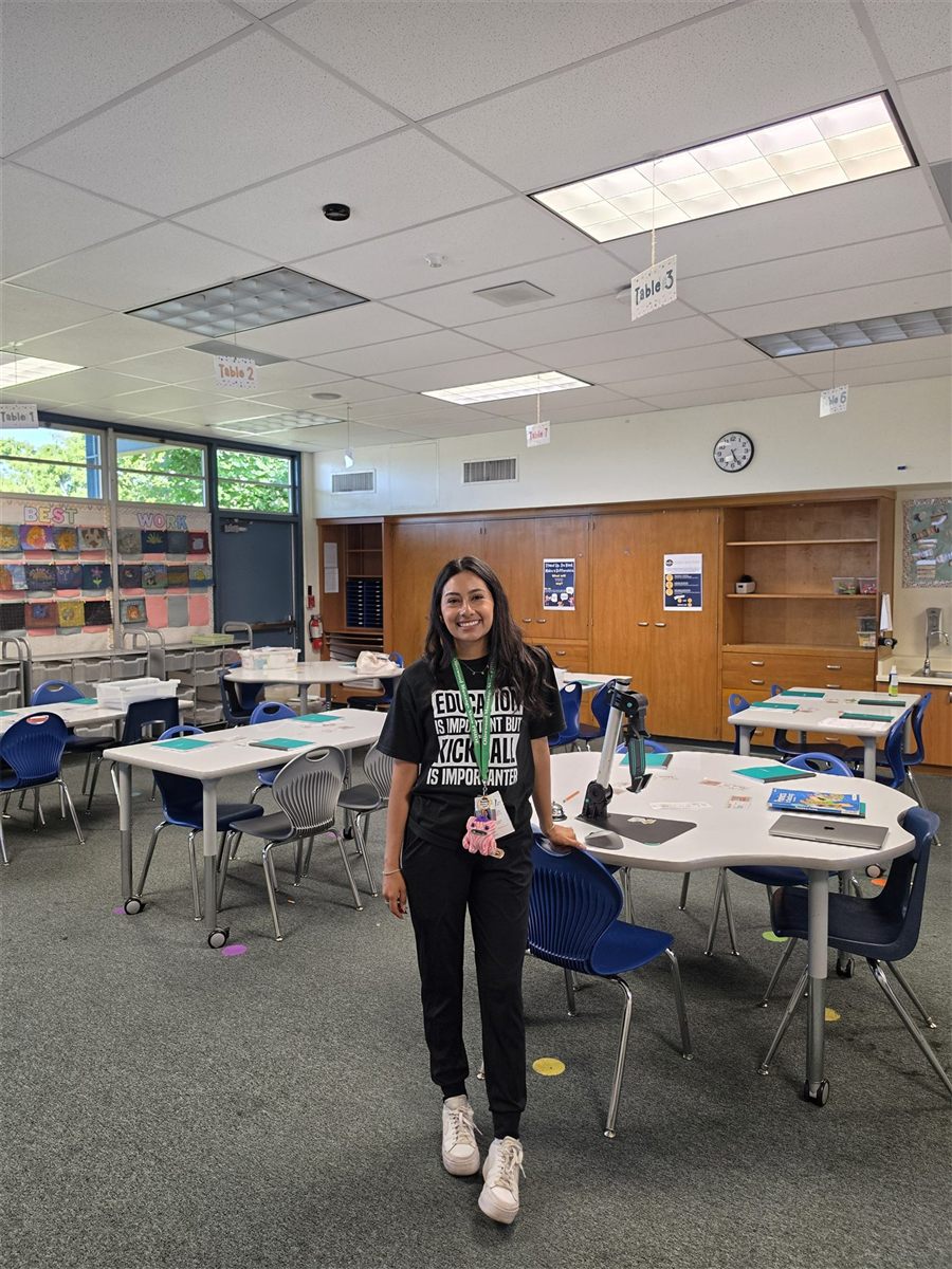 Josie smiling in her classroom