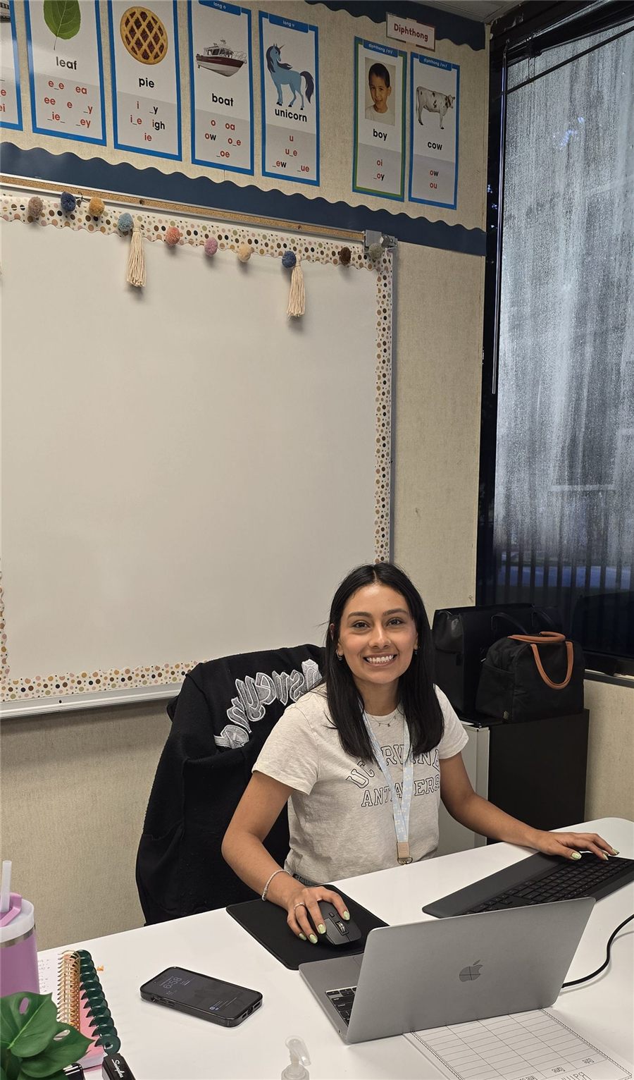 Josie at her classroom desk